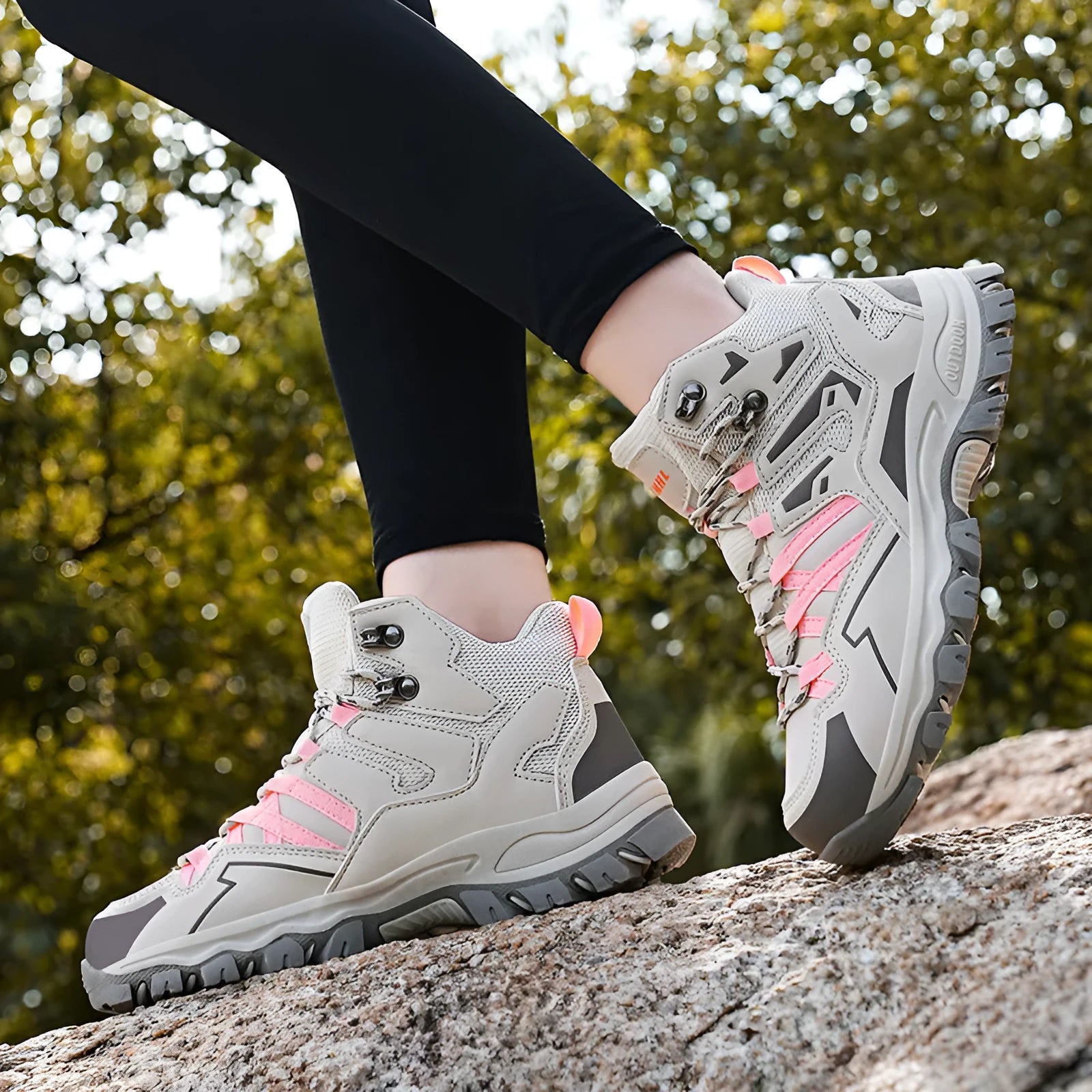 Men's and women's flannel hiking sneakers in various colours on a rocky outdoor path.