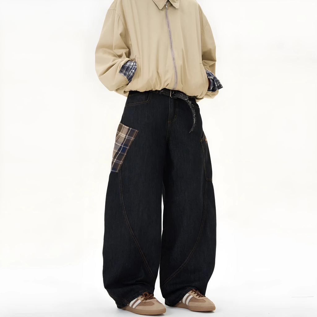 Loose straight-leg cotton trousers in a red plaid pattern, showing mid waist and casual fit.