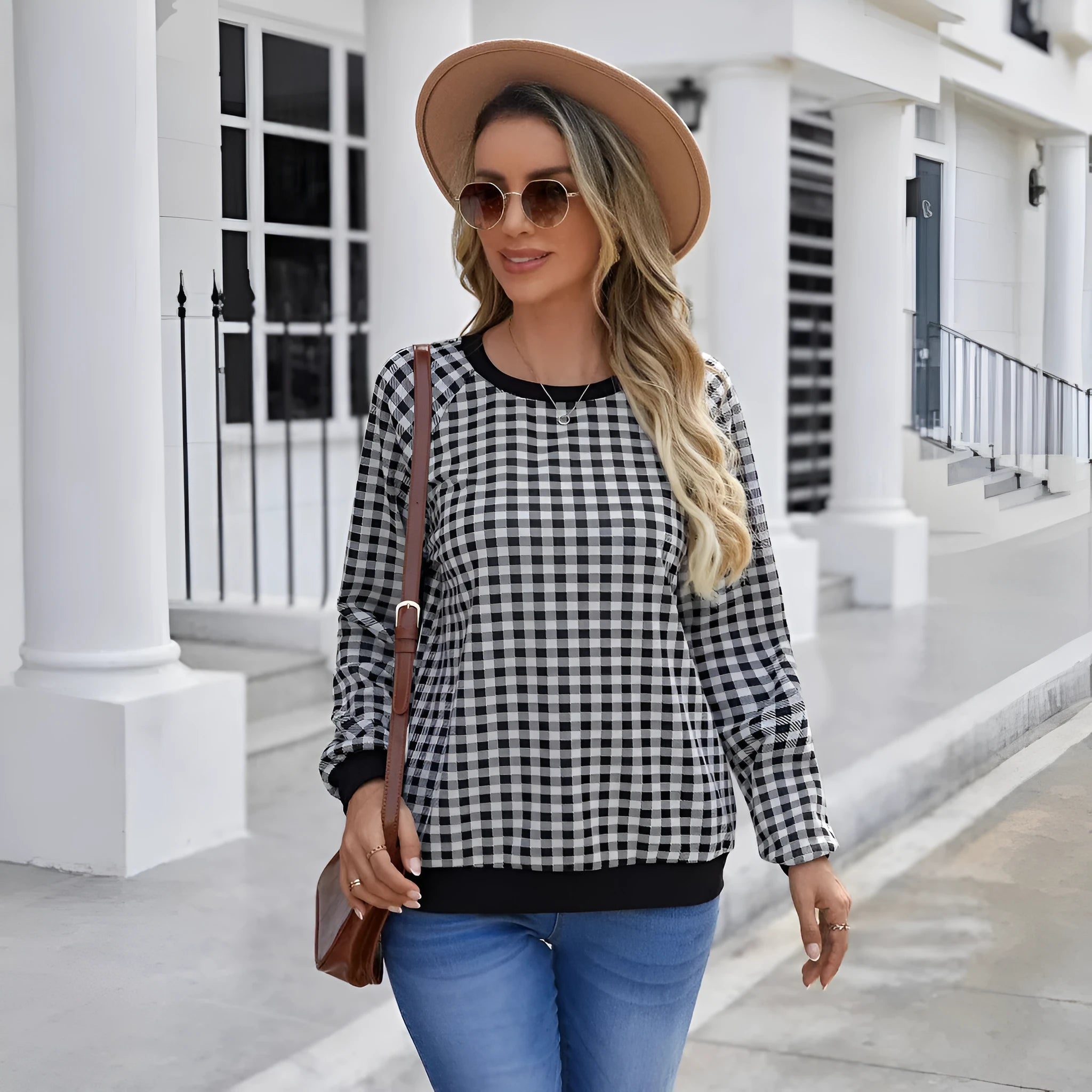 Black plaid stripe long sleeve pullover sweater laid flat, showing Japanese style pattern.