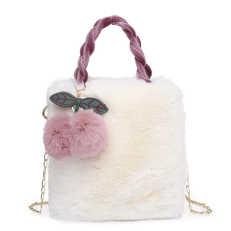 Large capacity soft plush bucket bag in beige with open outer pocket and single shoulder strap