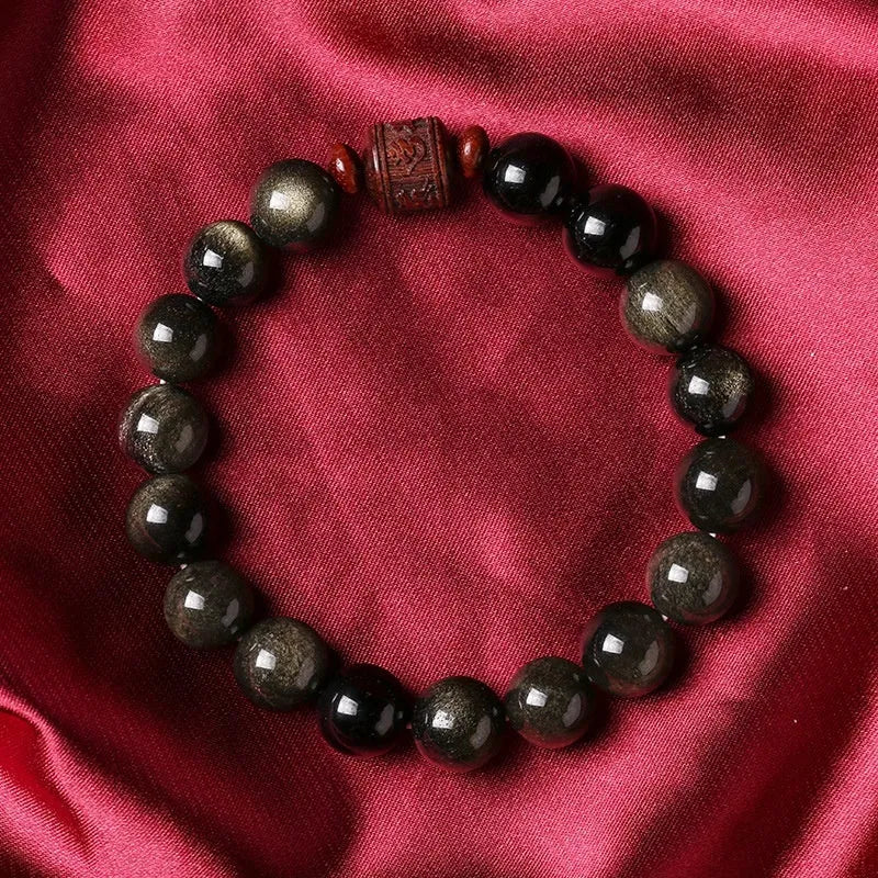 Hand-woven vintage bracelet with 10mm golden obsidian beads in retro style with national design elements