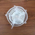 Set of six colourful silicone stretch lids in different sizes for covering bowls and food containers.