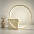 Wake up light alarm clock with sunrise simulation, colourful ambient lighting, and dual alarm, shown on a bedside table
