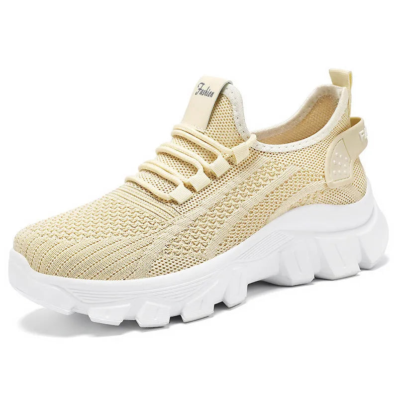 Men's white Flyknit tennis shoes with thick PVC sole and lace-up front