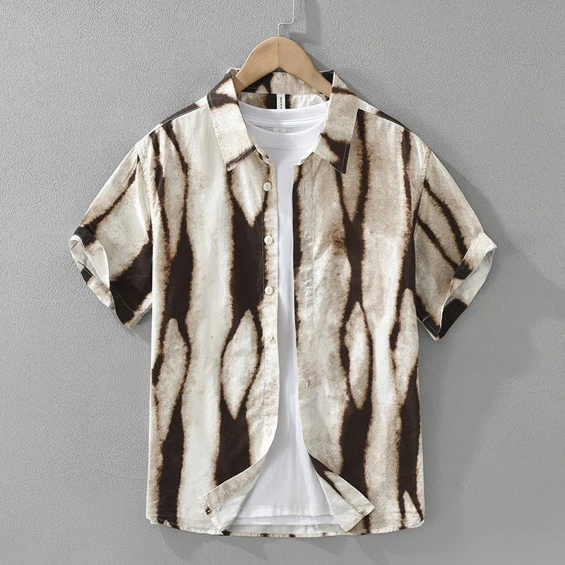 Man wearing a black retro striped short sleeve cardigan-style cotton shirt