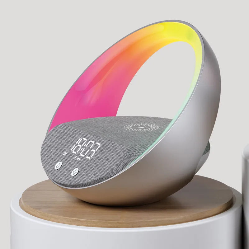Beige multifunctional Bluetooth speaker with wireless charging surface and ambient LED lighting on bedside table