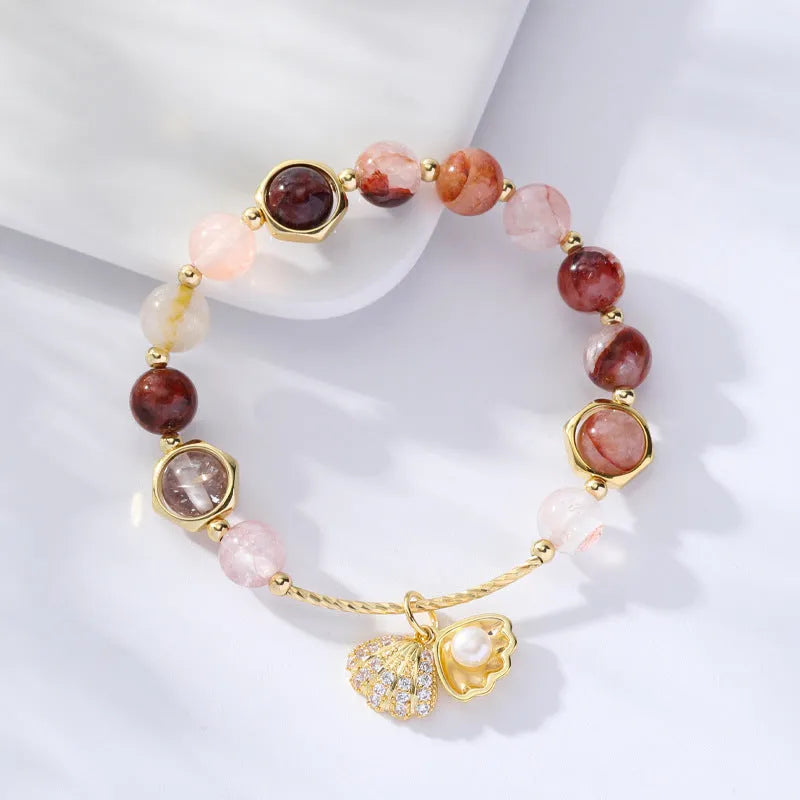 Women's crystal bracelet with coloured hair crystal shells and animal zodiac designs