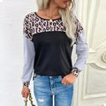 Women's loose fit round neck leopard print pullover sweater in black