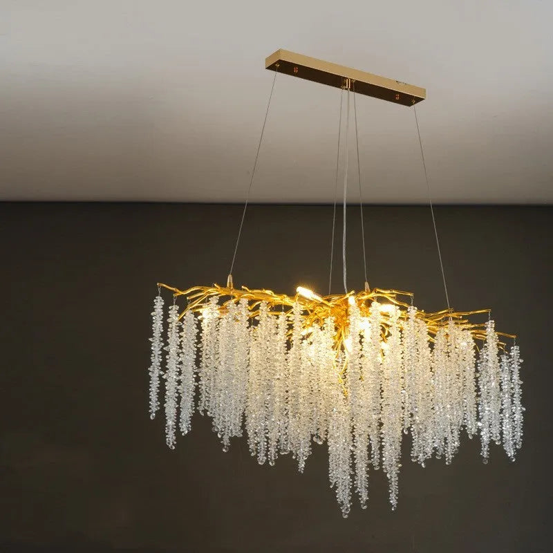 Modern crystal chandelier with adjustable chain and LED lights in a light luxury style.
