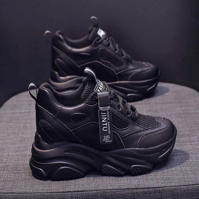 Women's black mesh platform casual shoes with hollow out design and a TPR sole.
