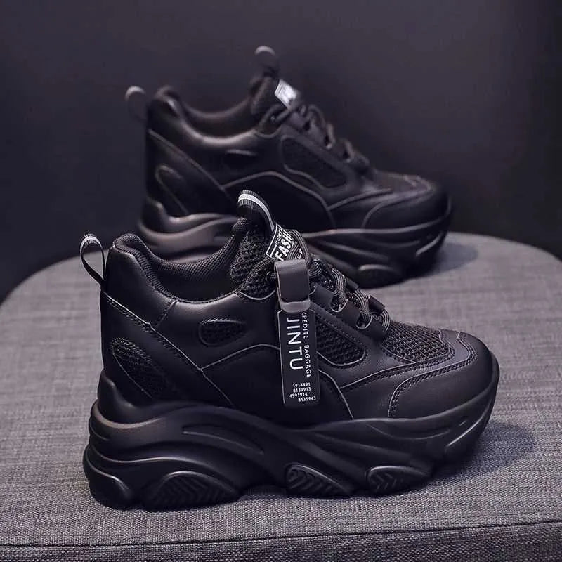 Women's black mesh platform casual shoes with hollow out design and a TPR sole.
