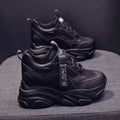 Women's black mesh platform casual shoes with hollow out design and a TPR sole.