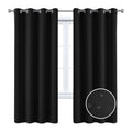 Full blackout polyester curtain with black lining, perforated top, beige colour, lying flat on surface