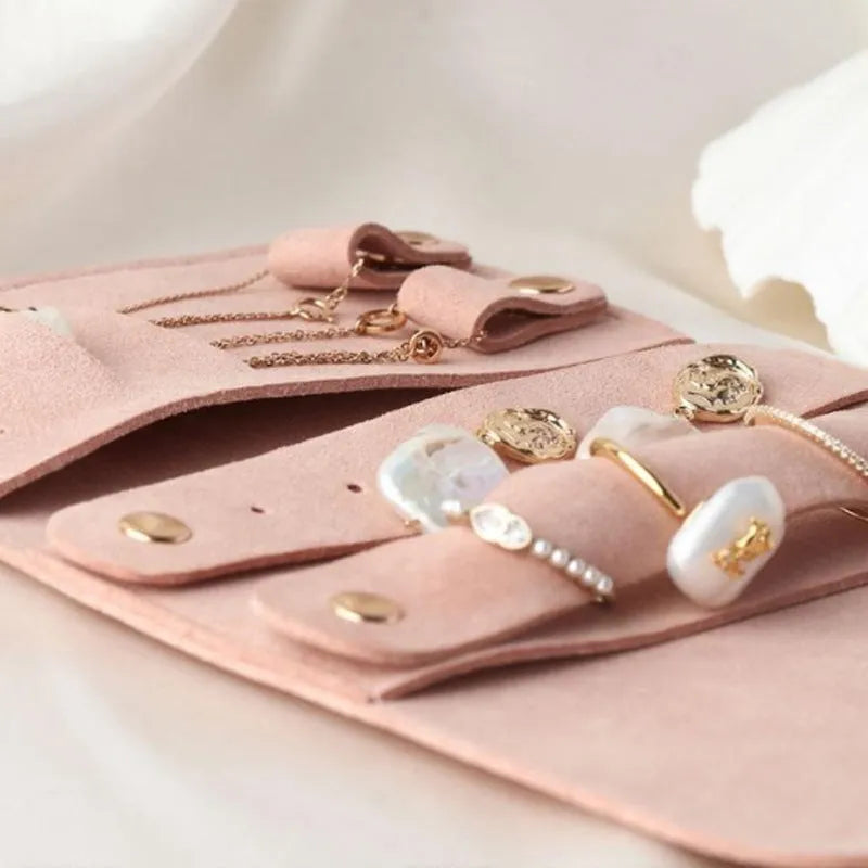 Brown soft leather square jewellery storage pouch measuring 12cm by 12cm