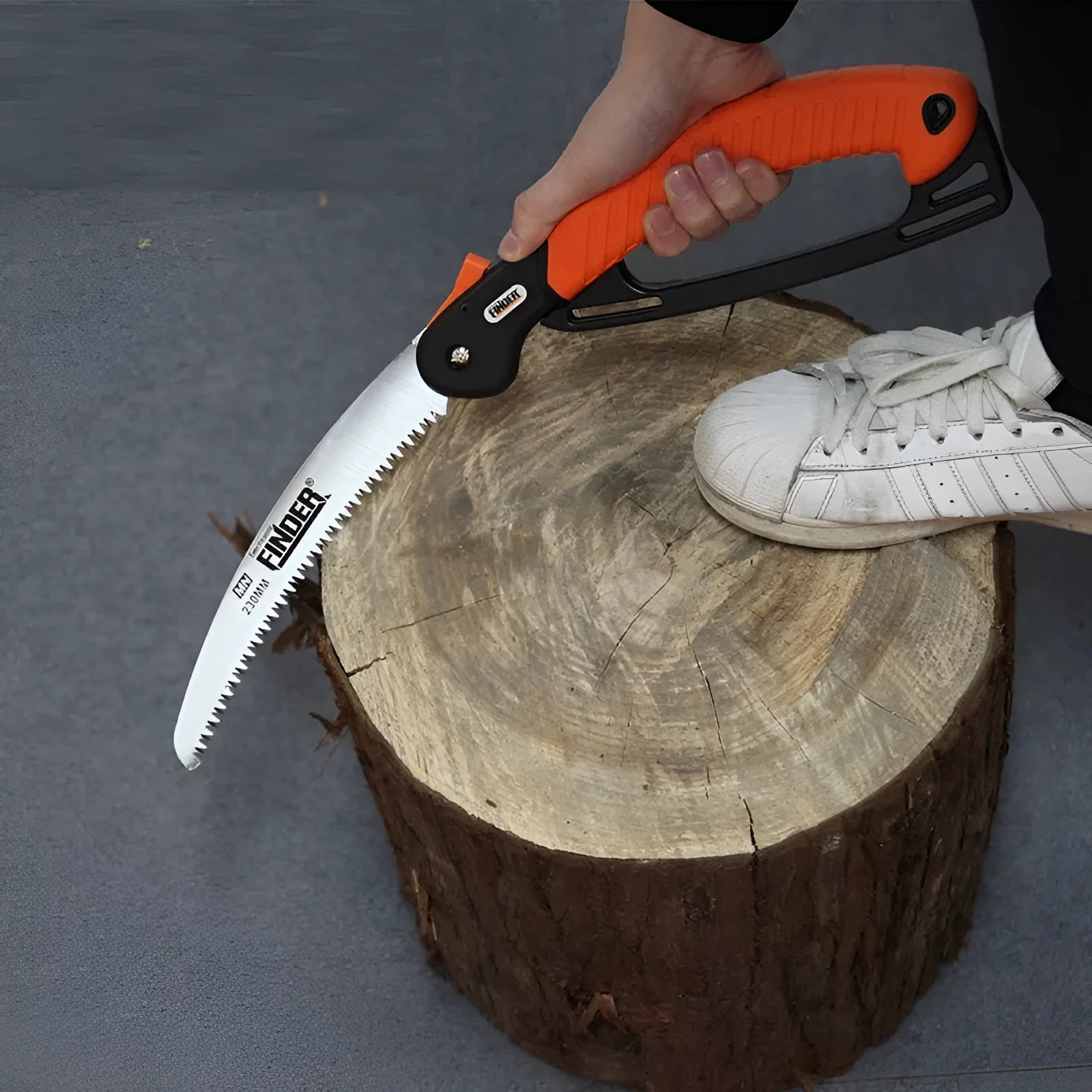 A folding garden hand saw with a 230mm steel blade and black TPR grip, shown both open and closed.