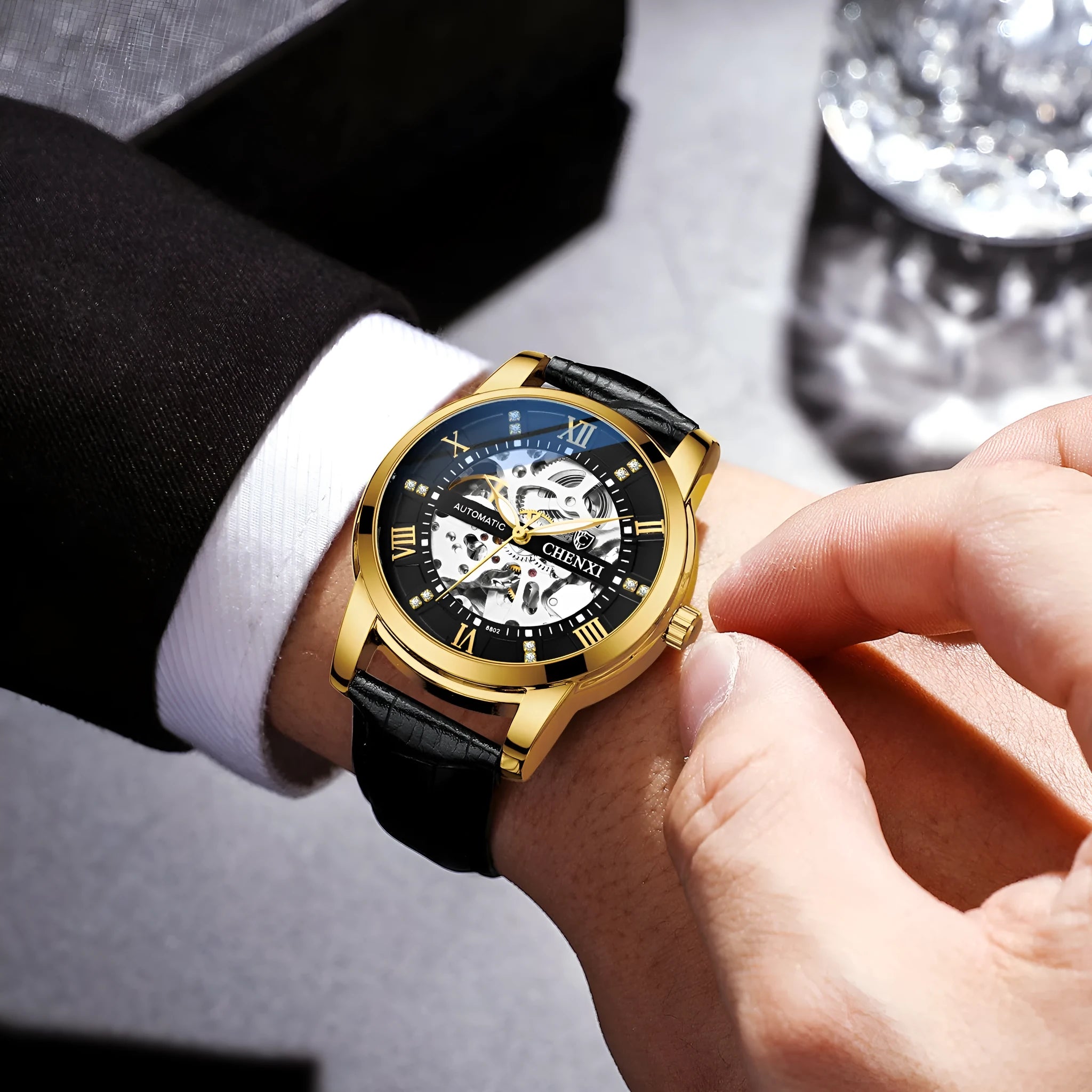 Hollow automatic mechanical watch with belt strap, black shell and black surface, 13mm thickness, business style for men