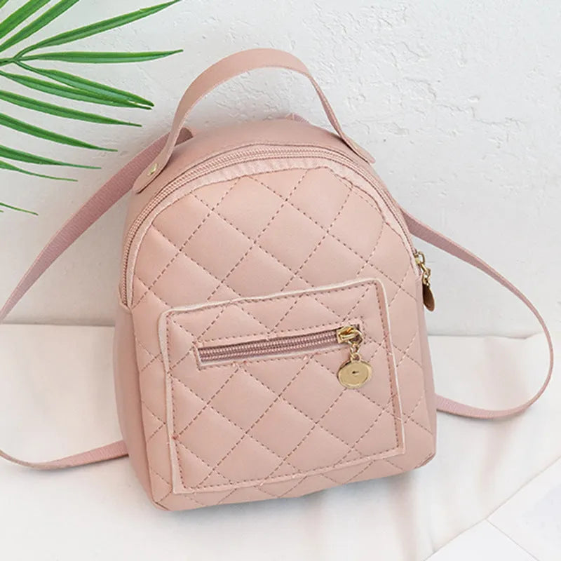 Girls' hard square PU backpack with embroidery in black, white, or pink, showing front and handle.