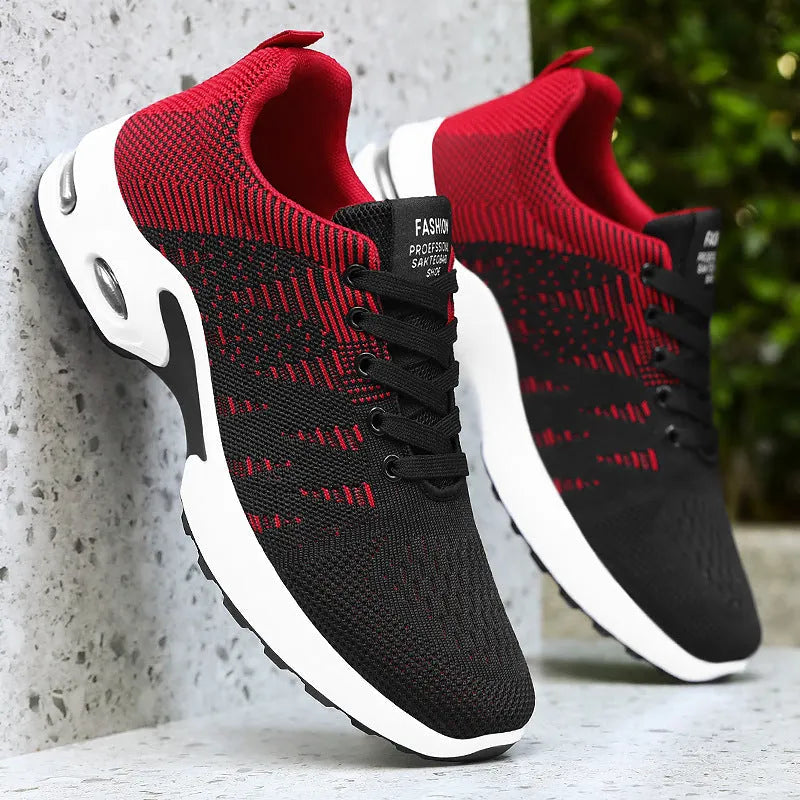 Men's low-top Flyknit mesh sneakers in black and blue colour, showcasing the lace-up design and round toe.