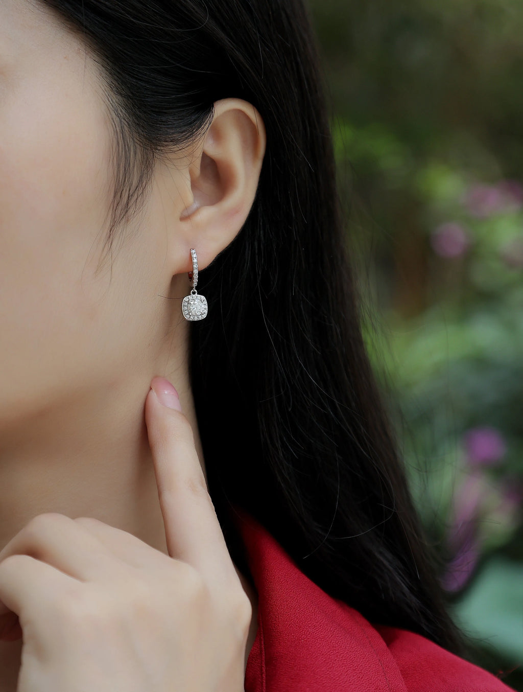 Pair of 0.5-carat total moissanite stud earrings in S925 silver with platinum plating, shown with gift box and GRA certificate