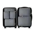 Travel buggy bag in memory cloth with polyester lining, six-piece compressed clothing set, 36-55L capacity, solid colour