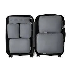 Travel buggy bag in memory cloth with polyester lining, six-piece compressed clothing set, 36-55L capacity, solid colour