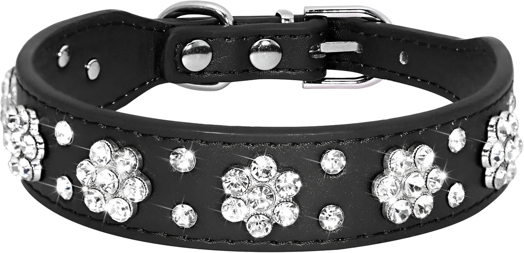 A black PU leather dog collar with a sparkling rhinestone flower pattern and metal studs, showing an adjustable metal buckle.