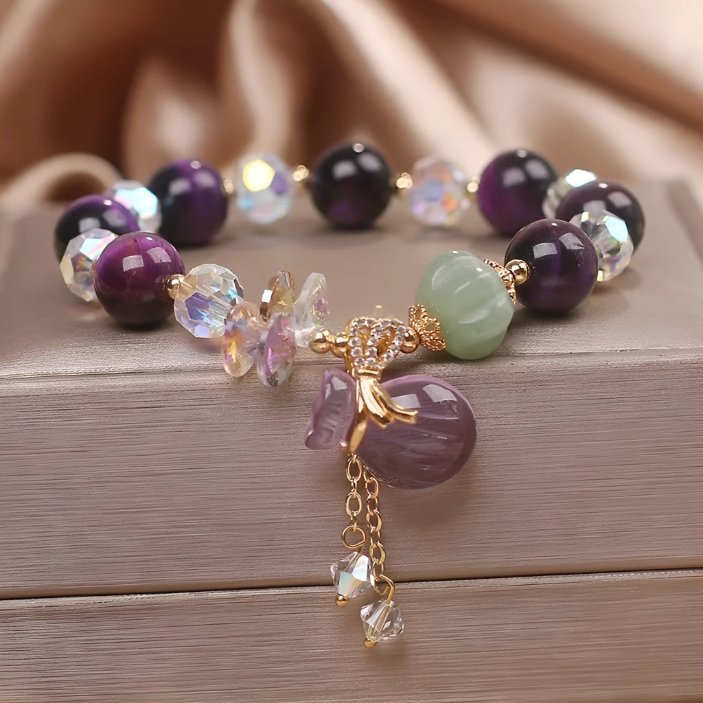 Women's purple tigereye crystal bracelet with money bag pendant and rhinestone decoration in forest style design