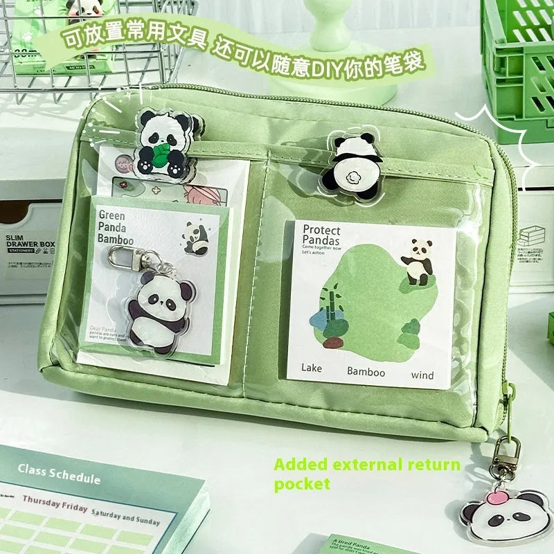 Green Korean-style canvas pencil case showing 12 open layers for organised pen and pencil storage
