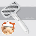 Automatic pet hair removal comb for dogs and cats in blue, grey, green, or pink.