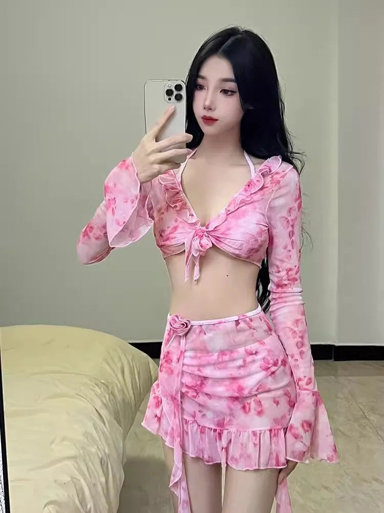 Women's cherry blossom pink floral bikini swimsuit on a mannequin