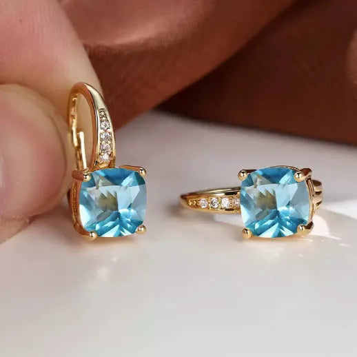 Geometric ear clips with square colourful moissanite inlays and electroplated gold finish