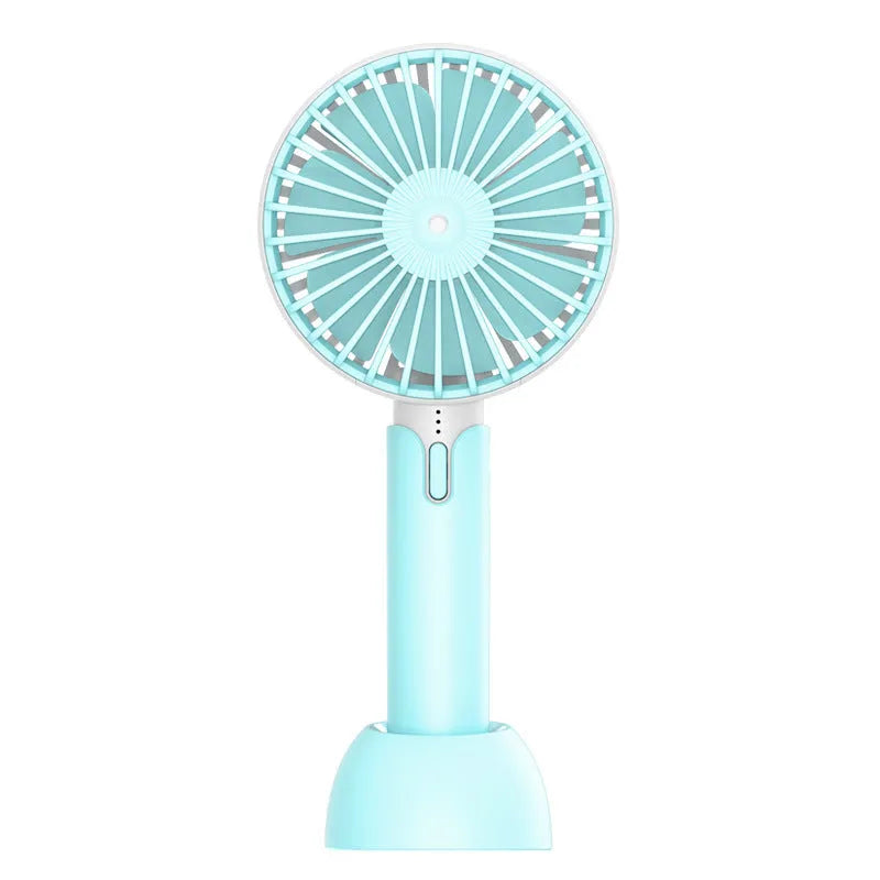 Blue handheld mini electric fan with USB cable, three-speed controls, and oscillation function on desktop
