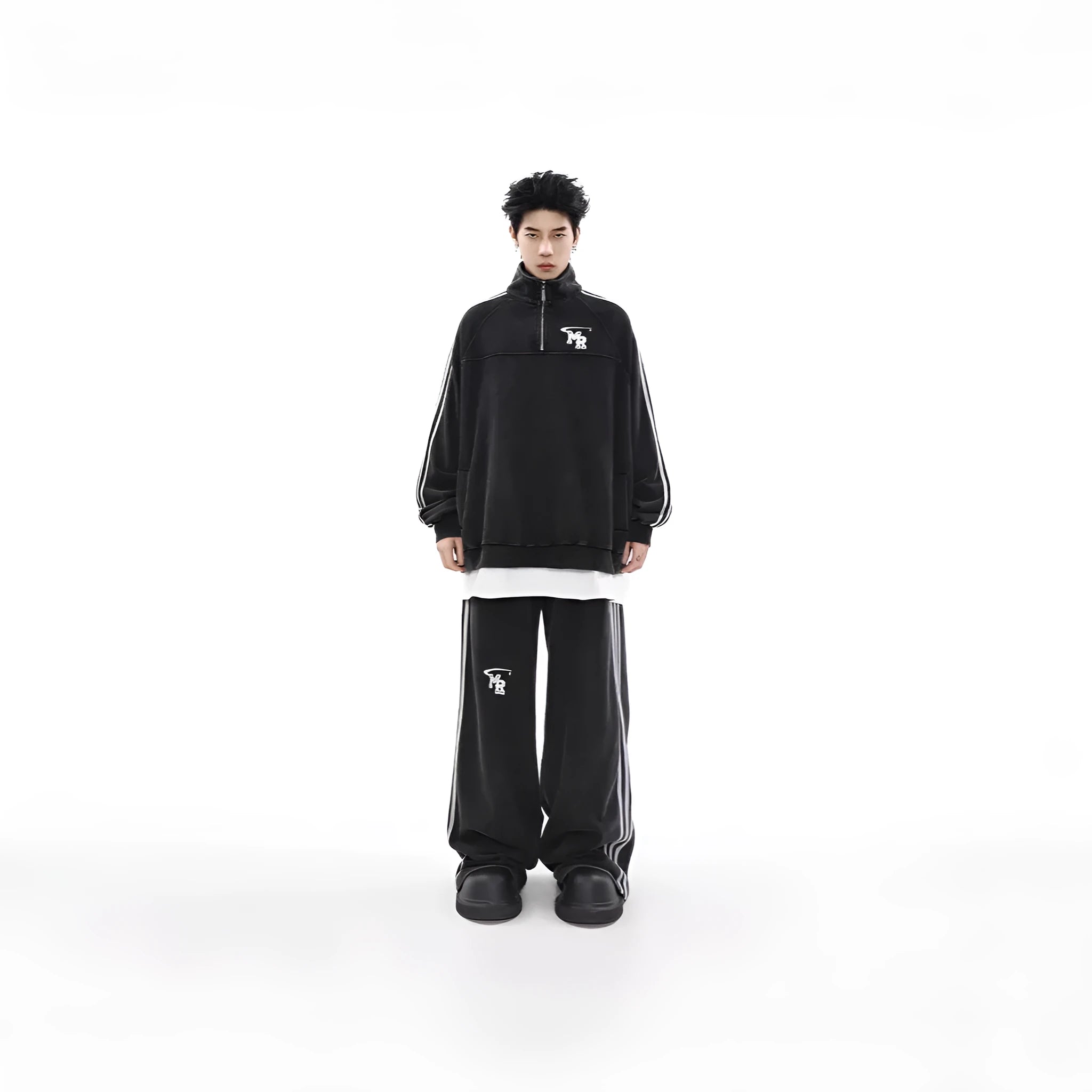 Man wearing a black American retro stand collar long sleeve hoodie coat.
