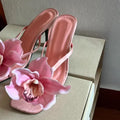 Pink women's sandals with satin uppers, artificial Phalaenopsis orchid decoration, and 3-6cm mid heel