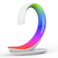 White swan-shaped desktop lamp with wireless charging pad and Bluetooth speaker functions, colourful LED lighting