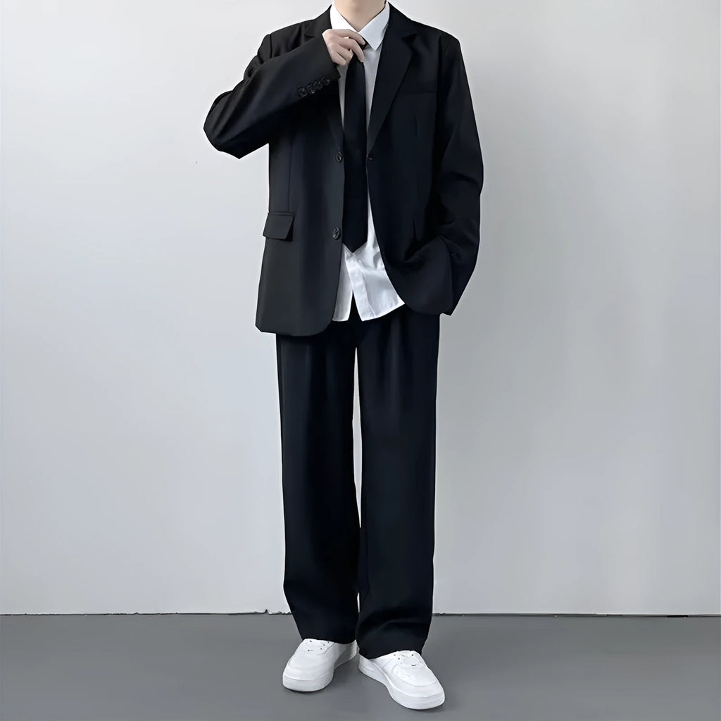 Men's plus size three-piece college style suit set featuring a grey jacket, trousers, white shirt, and striped tie.