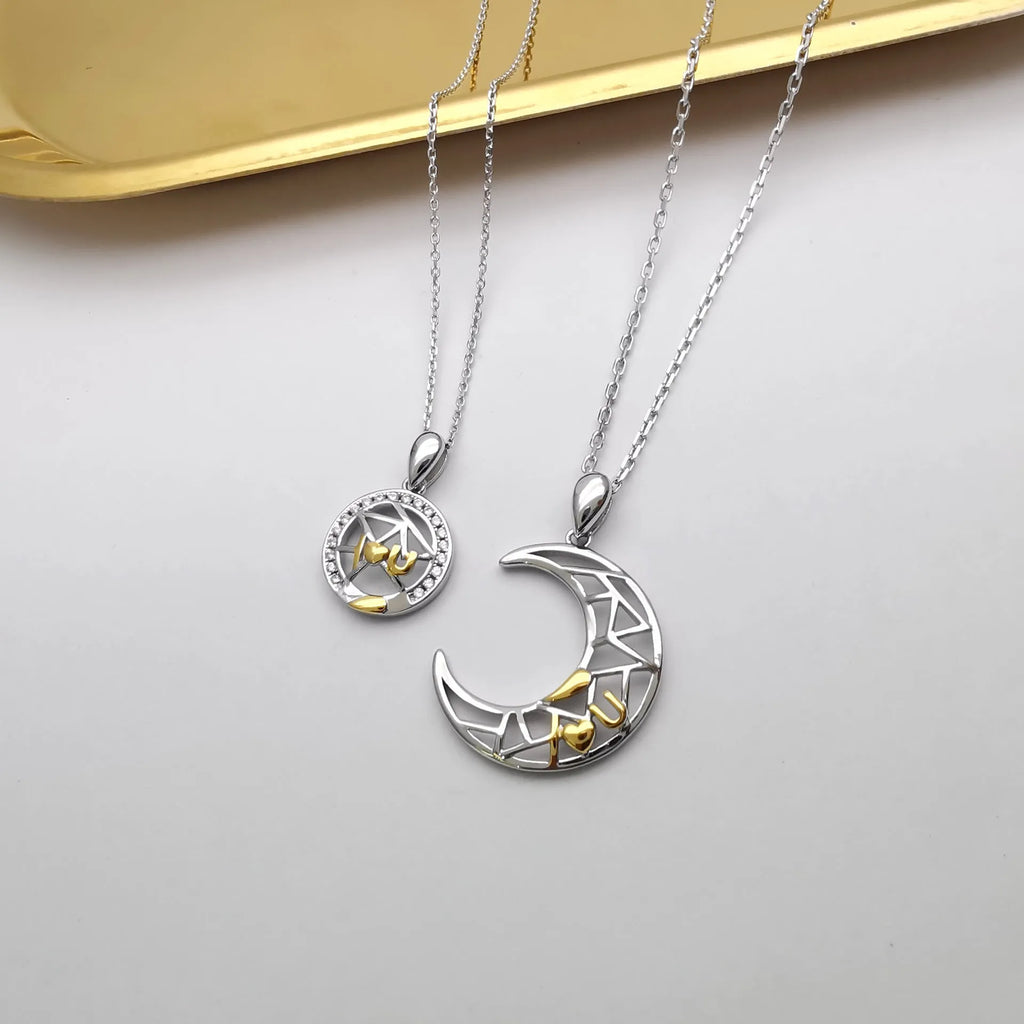 Sun and moon tooth couple necklace set with copper electroplated pendants and cross chain.