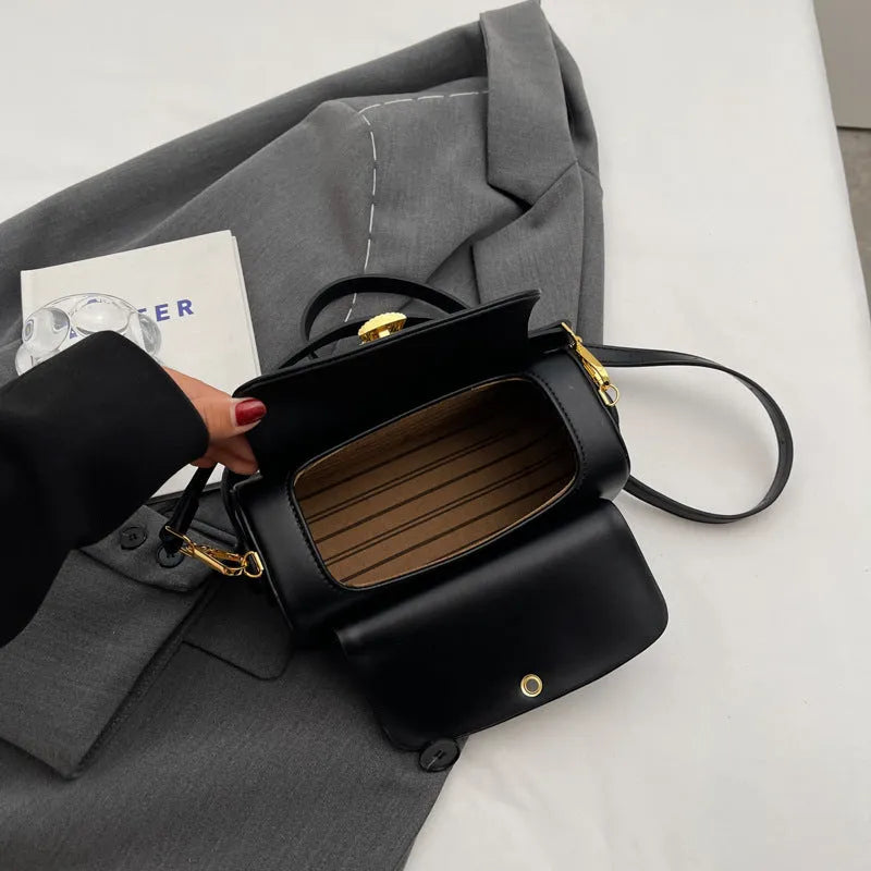 A personalised ladies' shoulder messenger bag in PU leather, showing the lettering feature and topstitching detail.