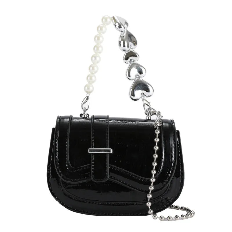 Silver women's PU leather mini saddle crossbody bag with square shape and single shoulder strap.
