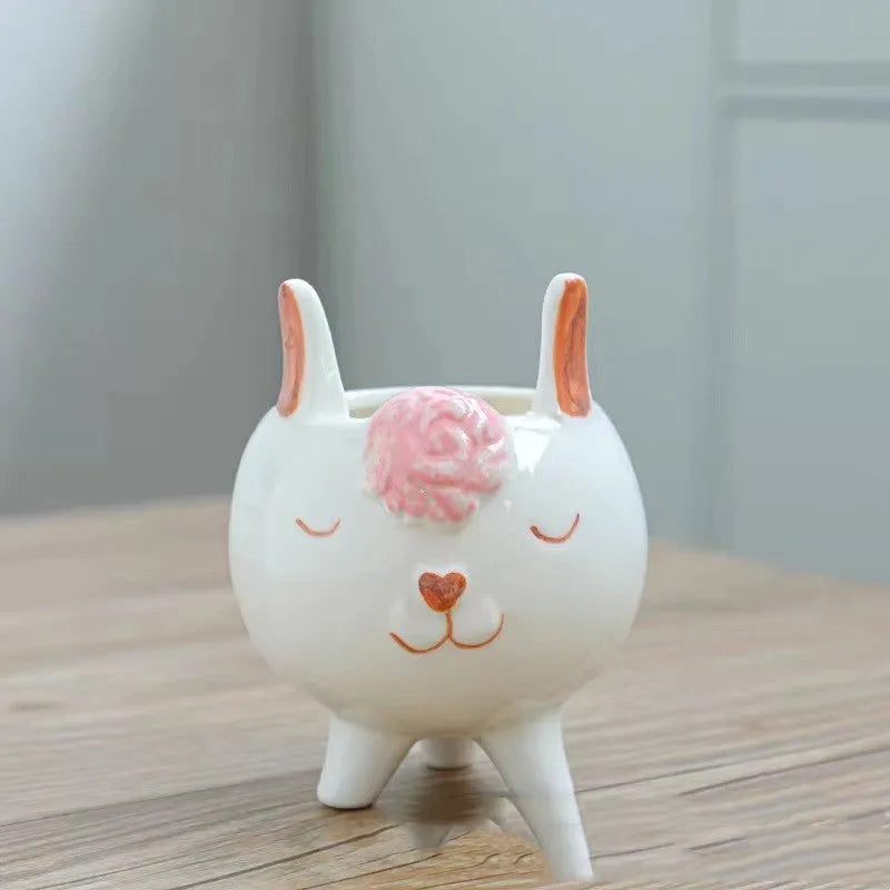 Ceramic succulent flowerpot with hand-painted cartoon animal design in pastel colours