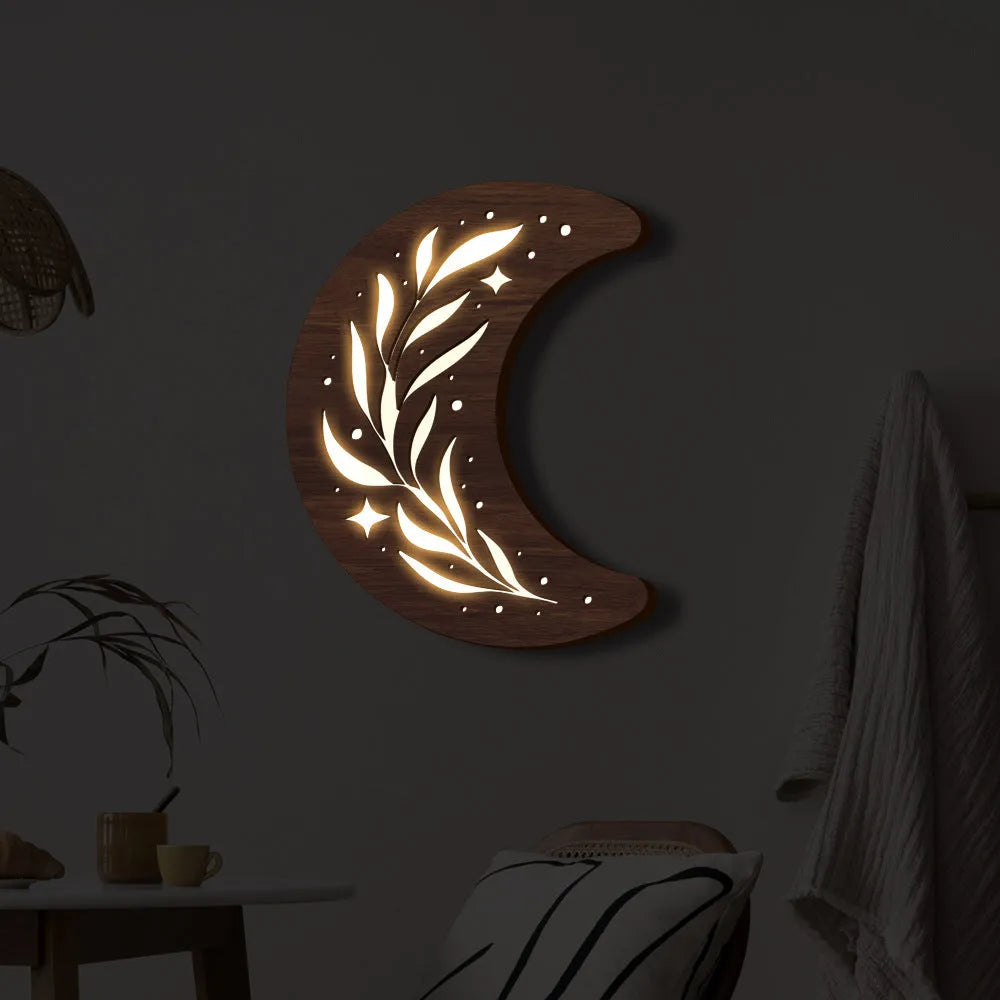 Bohemian style three-dimensional carved wooden leaf crescent pendant lamp with luminous night light.