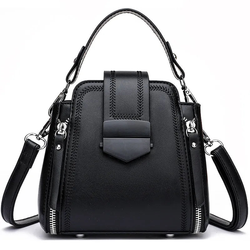 Small square vertical women's handbag in soft textured PU leather, shown in multiple colour options.