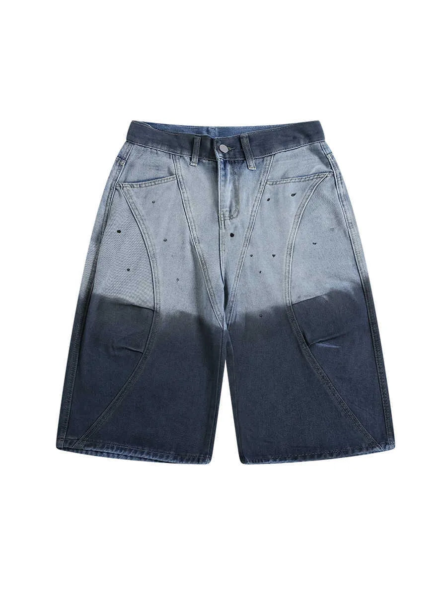 Blue tie-dye gradient cropped jeans with loose fit and worn wash on a mid-waist