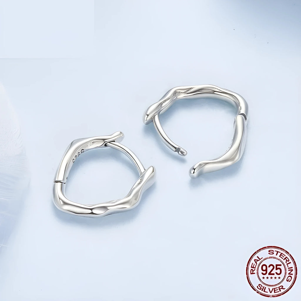 Geometric 925 sterling silver ear clip for women with polished finish and ellipse shape