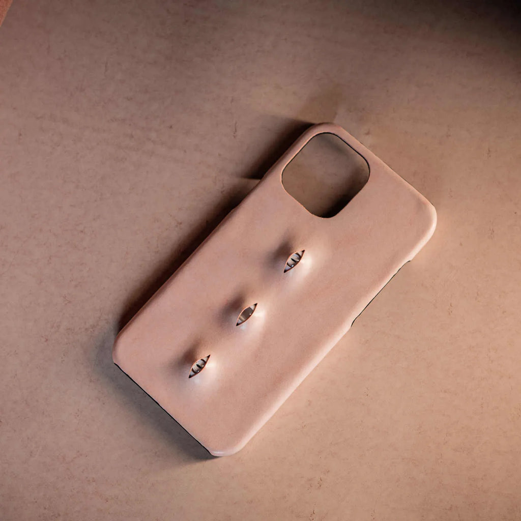 Pink eye-shaped phone case in waxed vegetable-tanned cowhide with PC bottom shell for iPhone