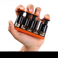 A grey and orange non-slip silicone finger trainer for musicians and climbing.