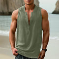 Man wearing a mint green sleeveless cotton linen casual shirt