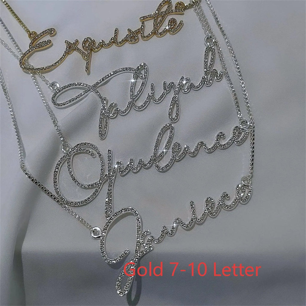 Personalised stainless steel name necklace with diamond-studded letters in silver, shown at an adjustable length.