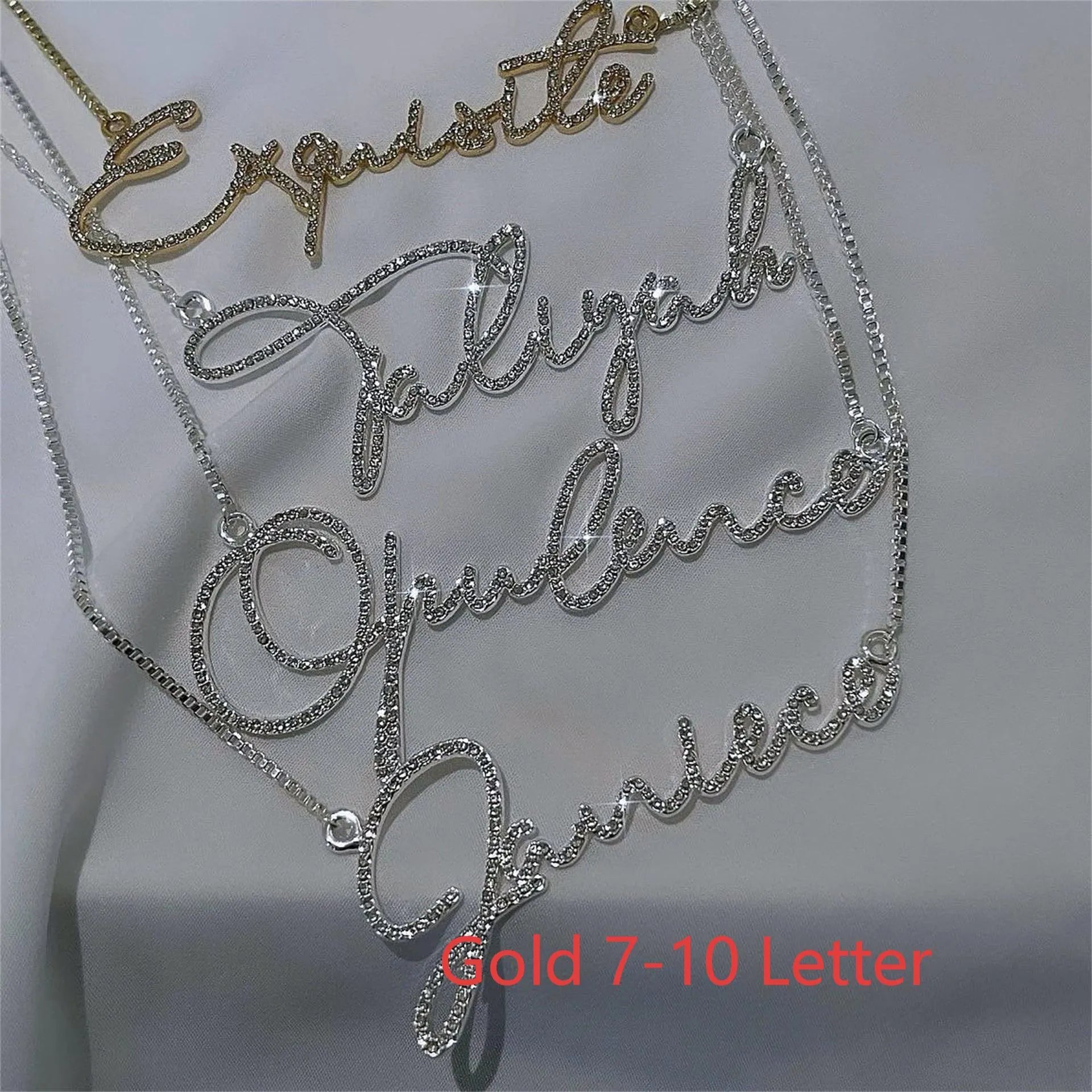 Personalised stainless steel name necklace with diamond-studded letters in silver, shown at an adjustable length.