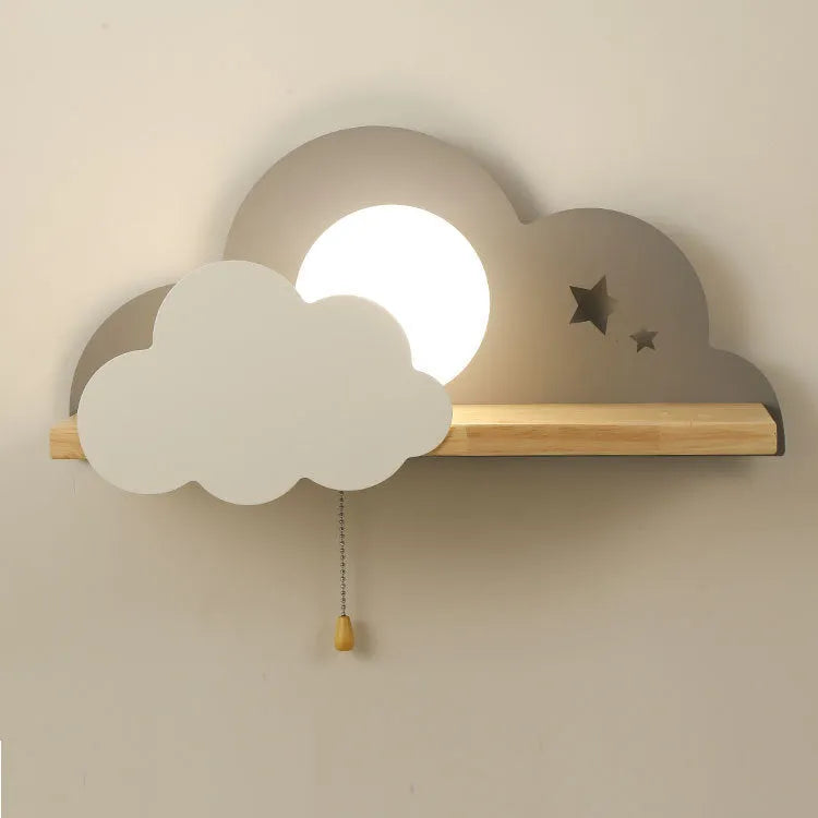 Cloud-shaped decorative glass wall lamp mounted on a wall, showing its silhouette and dimensions.